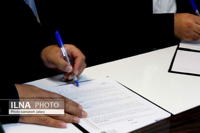 توافق همکاری فینوداد بانک ملی با فاوای آستان قدس رضوی