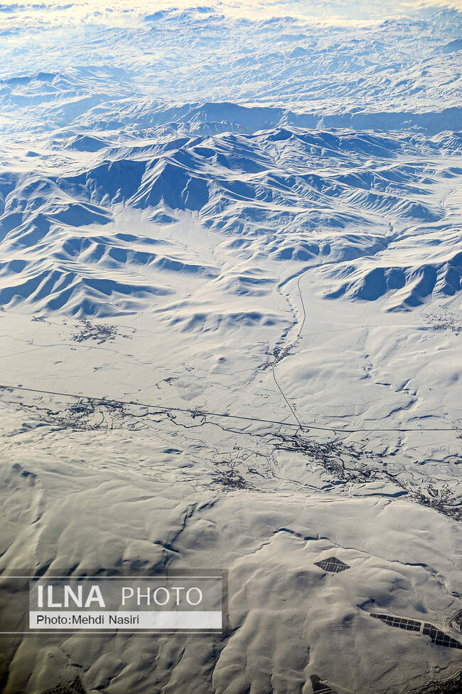Aerial images of the snowy mountains on the border of Iran and Türkiye