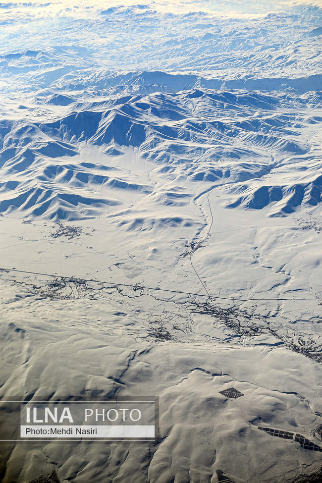 Aerial images of the snowy mountains on the border of Iran and Türkiye