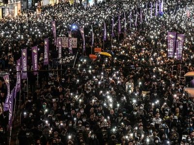 Peaceful Hong Kong march marred by fire outside court, police say
