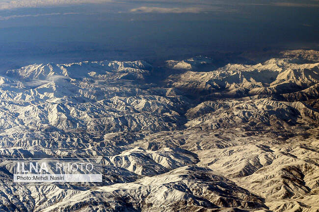 Aerial images of the snowy mountains on the border of Iran and Türkiye
