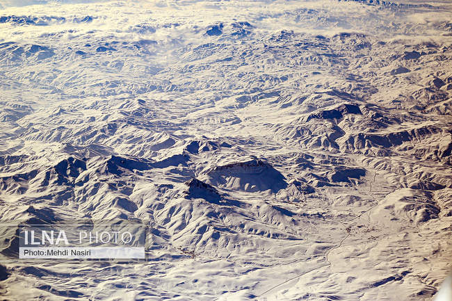 Aerial images of the snowy mountains on the border of Iran and Türkiye