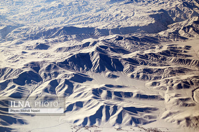 Aerial images of the snowy mountains on the border of Iran and Türkiye