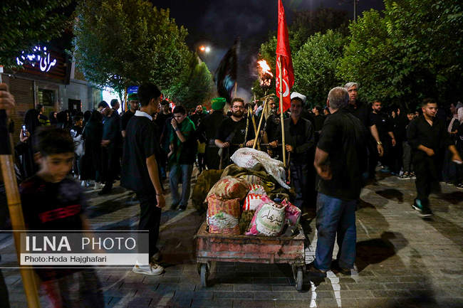 آیین مشعل گردانی دسته نجفی های مقیم قم