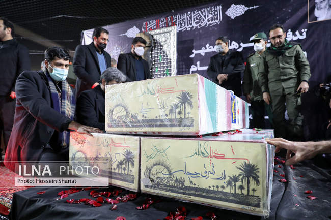 تدفین سه شهید گمنام در عرصه میدان شهدای مشهد