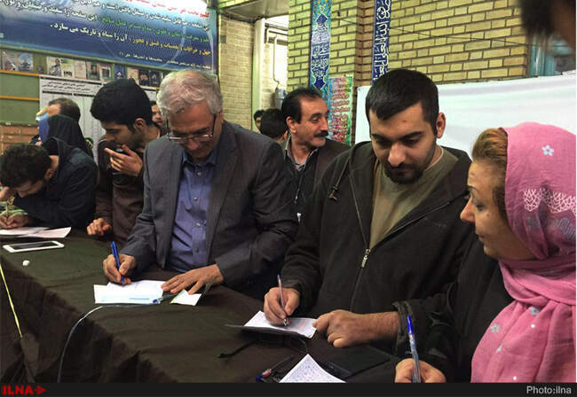 علی ربیعی در جنوب تهران رای خود را به صندوق انداخت