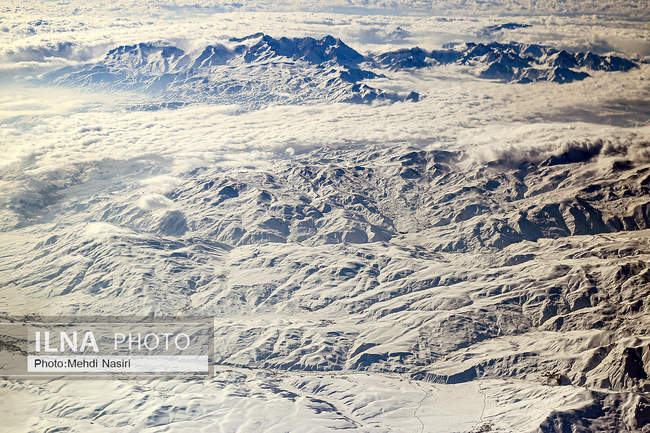 Aerial images of the snowy mountains on the border of Iran and Türkiye