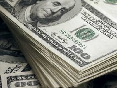 کشف بیش از ۳۰ هزار دلار تقلبی در "اسلام آباد غرب"
