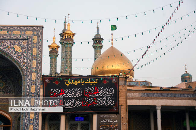 تعویض پرچم گنبد نورانی حضرت فاطمه معصومه سلام الله علیها